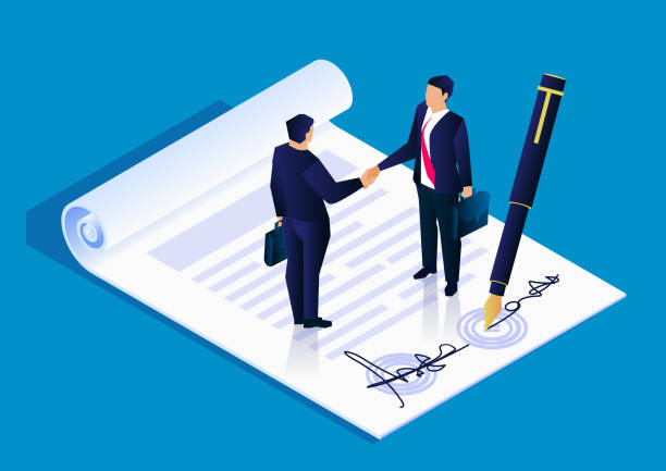 Two business professionals shaking hands over a signed document, symbolizing agreement in DMCC licensing.